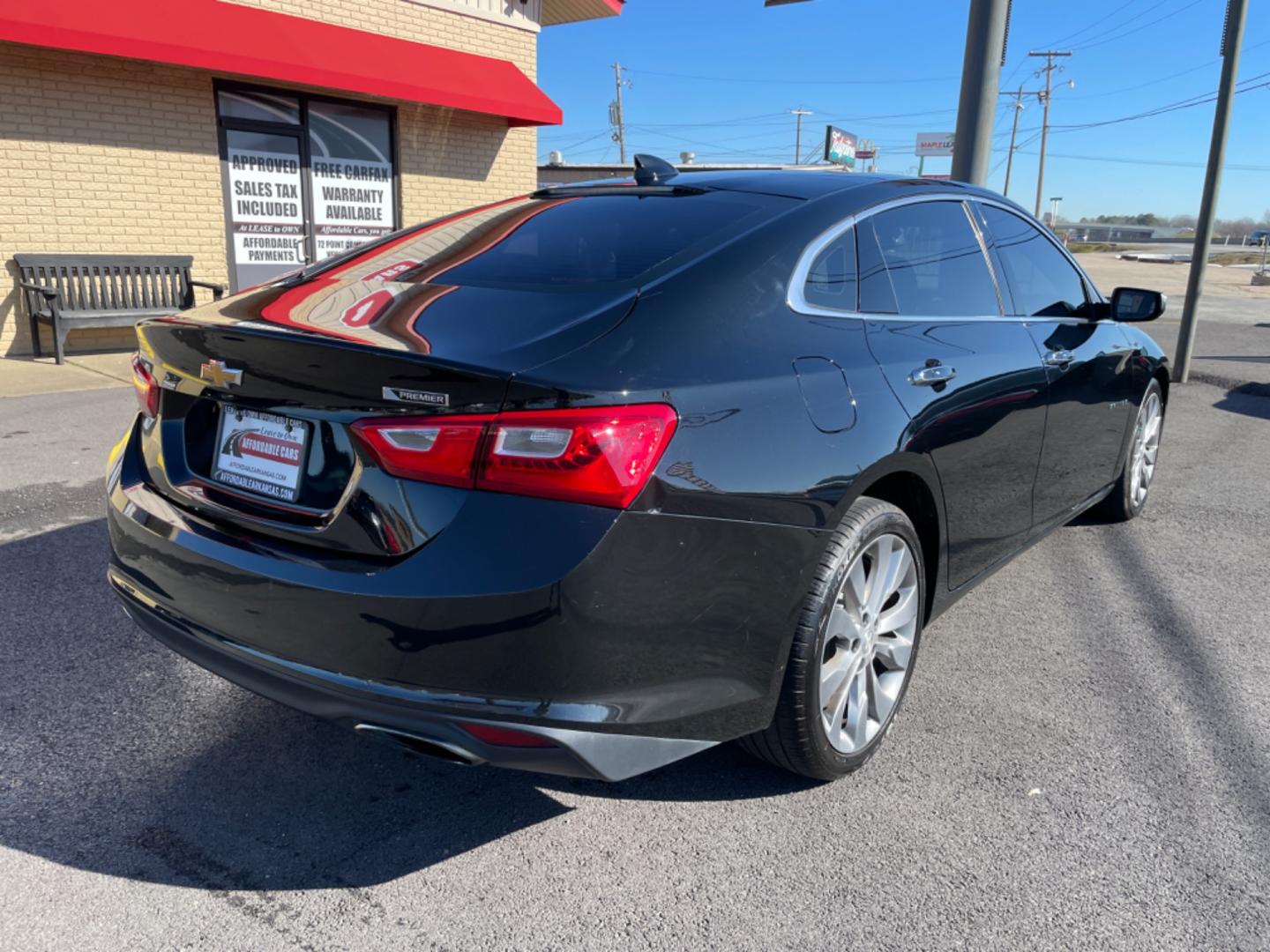 2017 Black Chevrolet Malibu (1G1ZH5SX0HF) with an 4-Cyl, Turbo, 2.0 Liter engine, Automatic, 9-Spd transmission, located at 8008 Warden Rd, Sherwood, AR, 72120, (501) 801-6100, 34.830078, -92.186684 - Photo#7